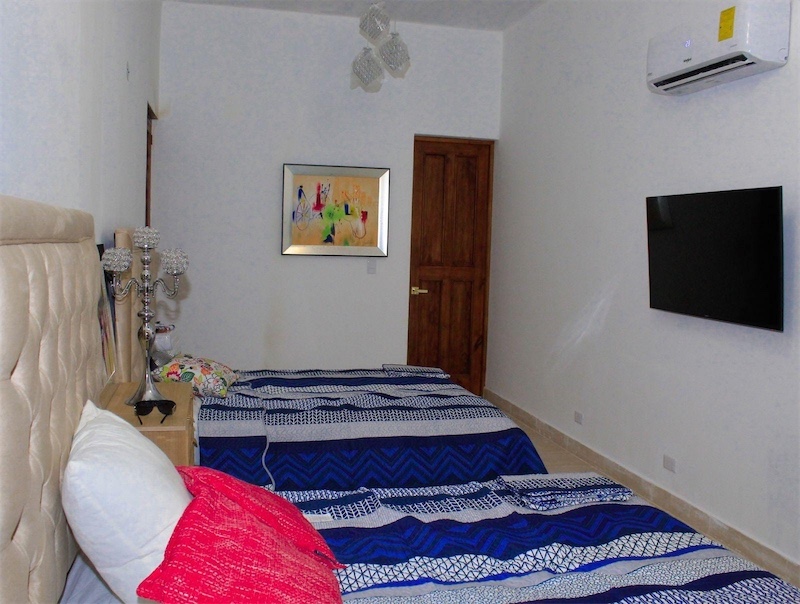 casas vacacionales y villas - Venta de Villa amueblada en cap Cana Green Village con 1500 mts zona turista  8