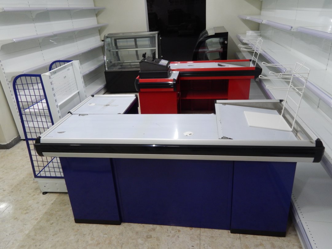 equipos profesionales - Mobiliario para area de caja de supermercado, minimarkets, y tiendas