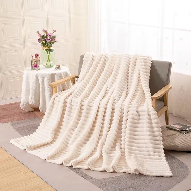 muebles y colchones - manta rayada 