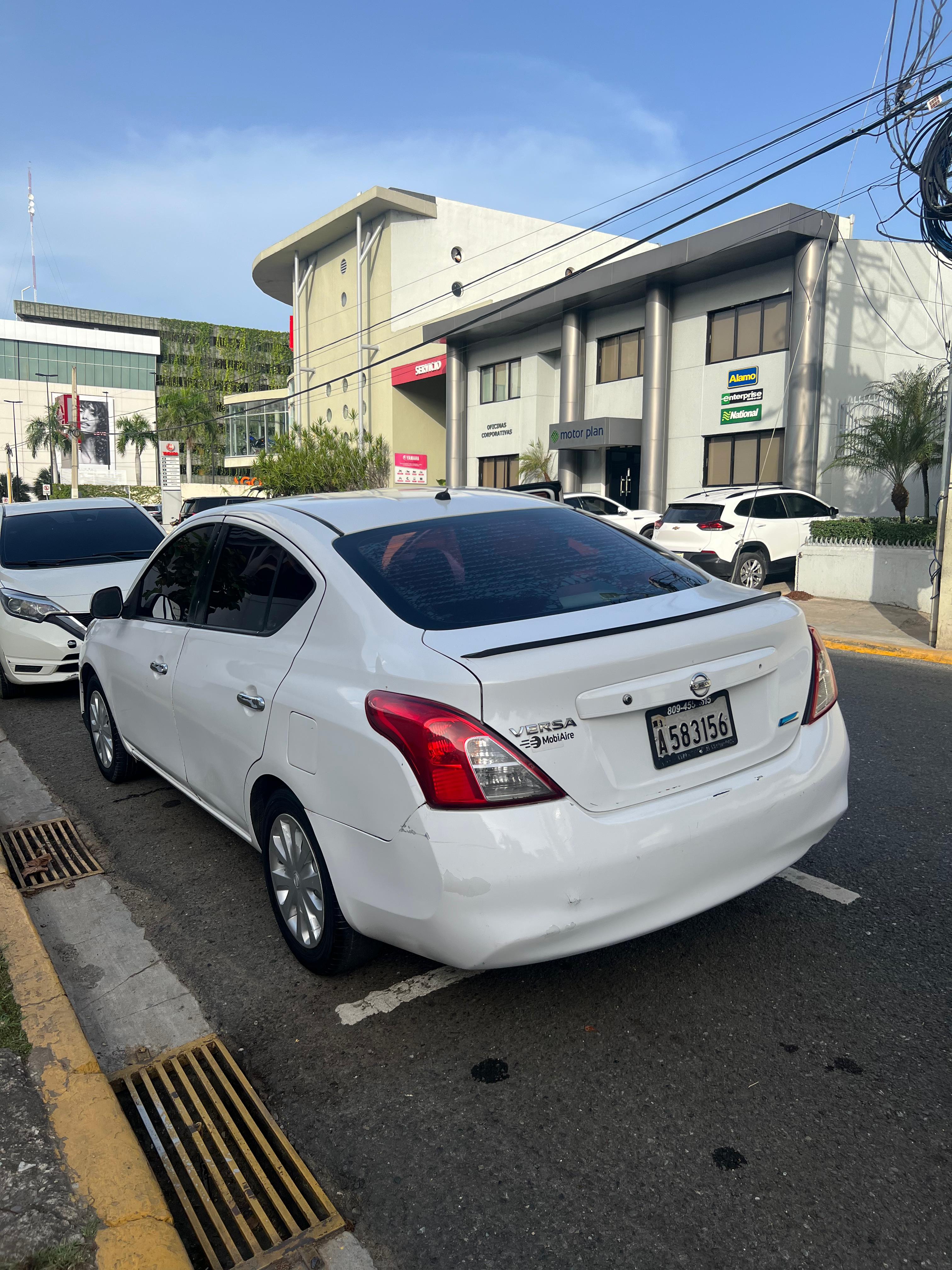 carros - Ninsan versa 5