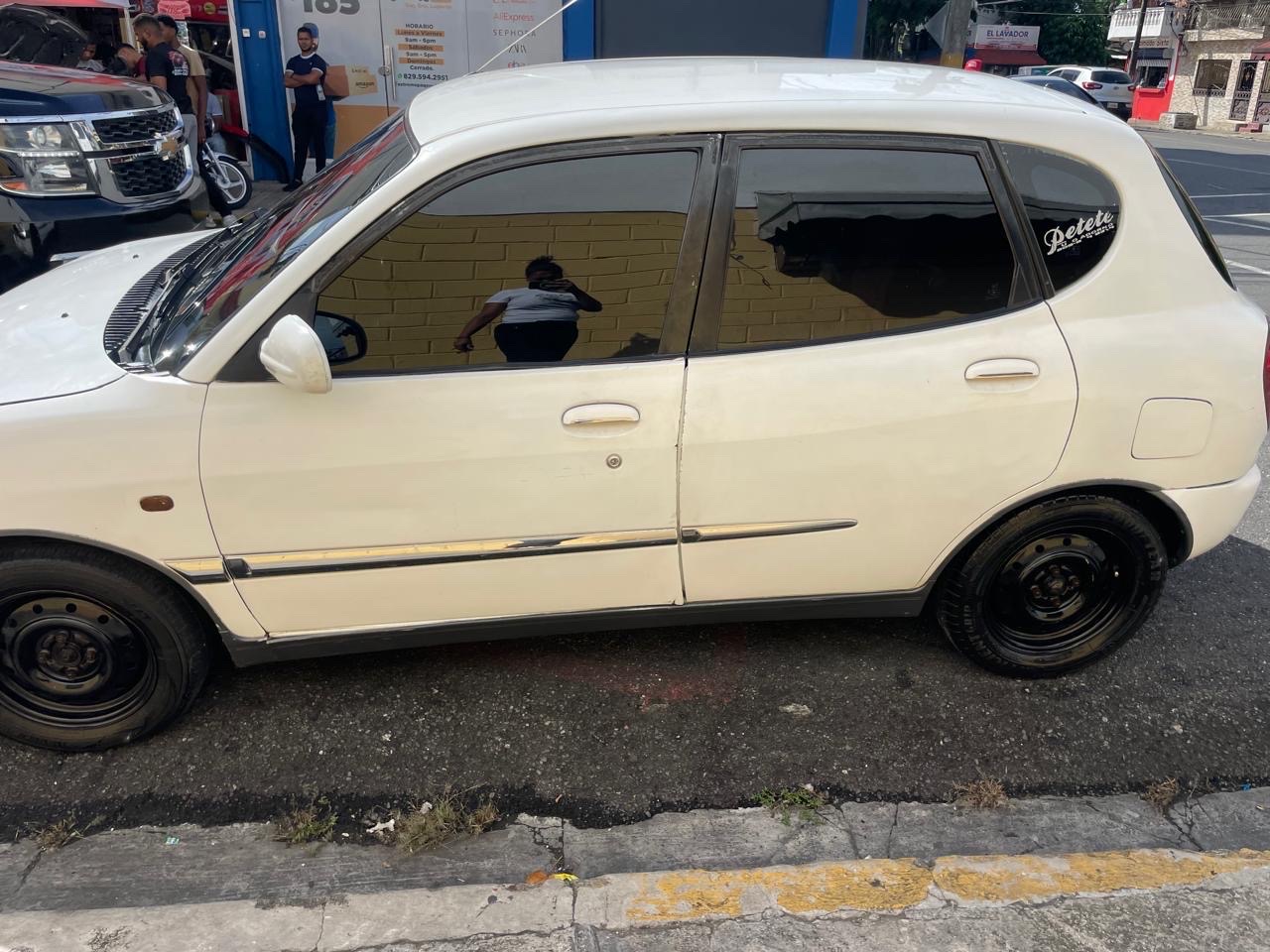 carros - Toyota duet 2003  1