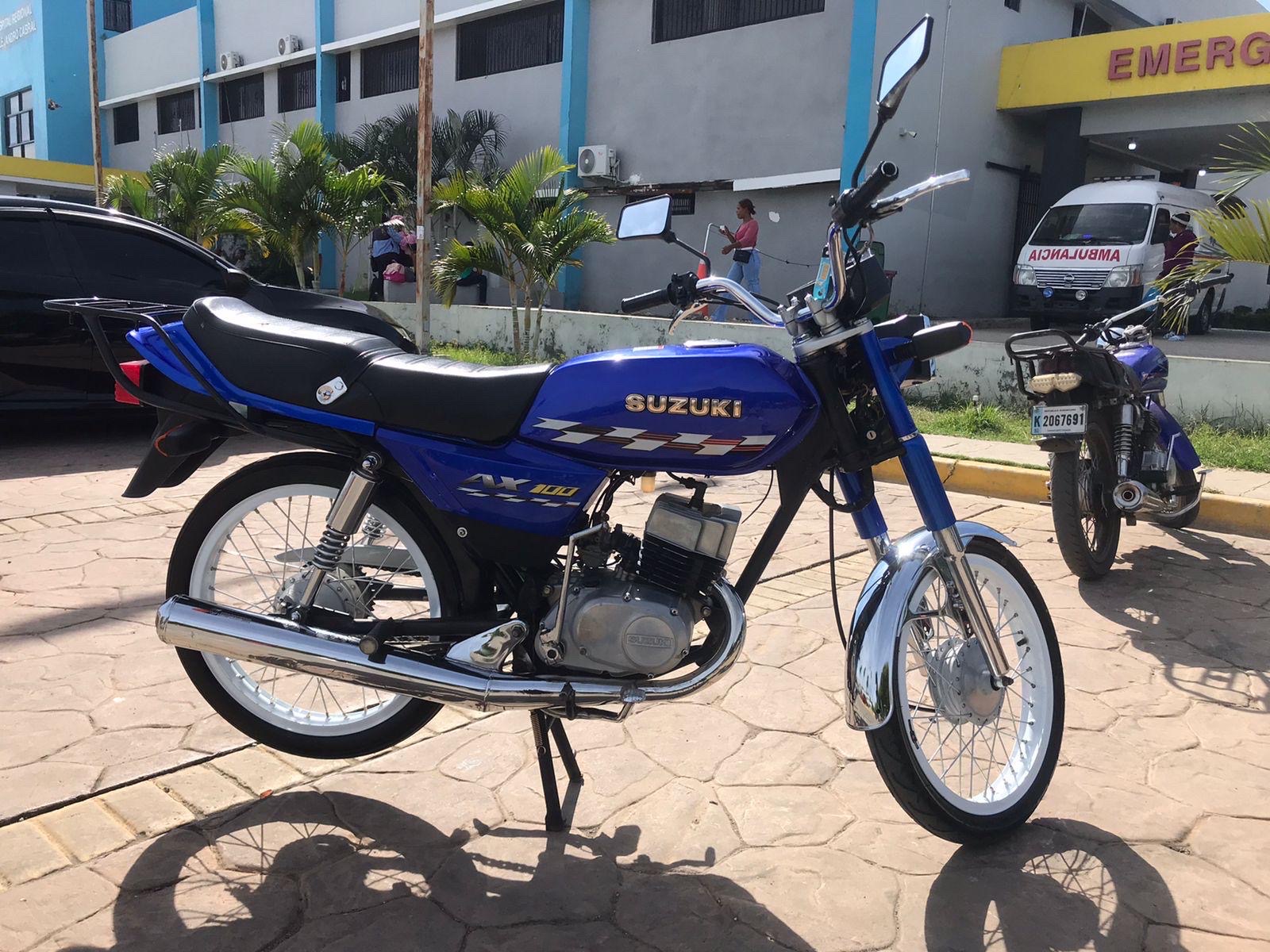 motores y pasolas - vendo Suzuki Ax100 2011 sin detalles, así como se ve en las fotos esta nuevo. 0