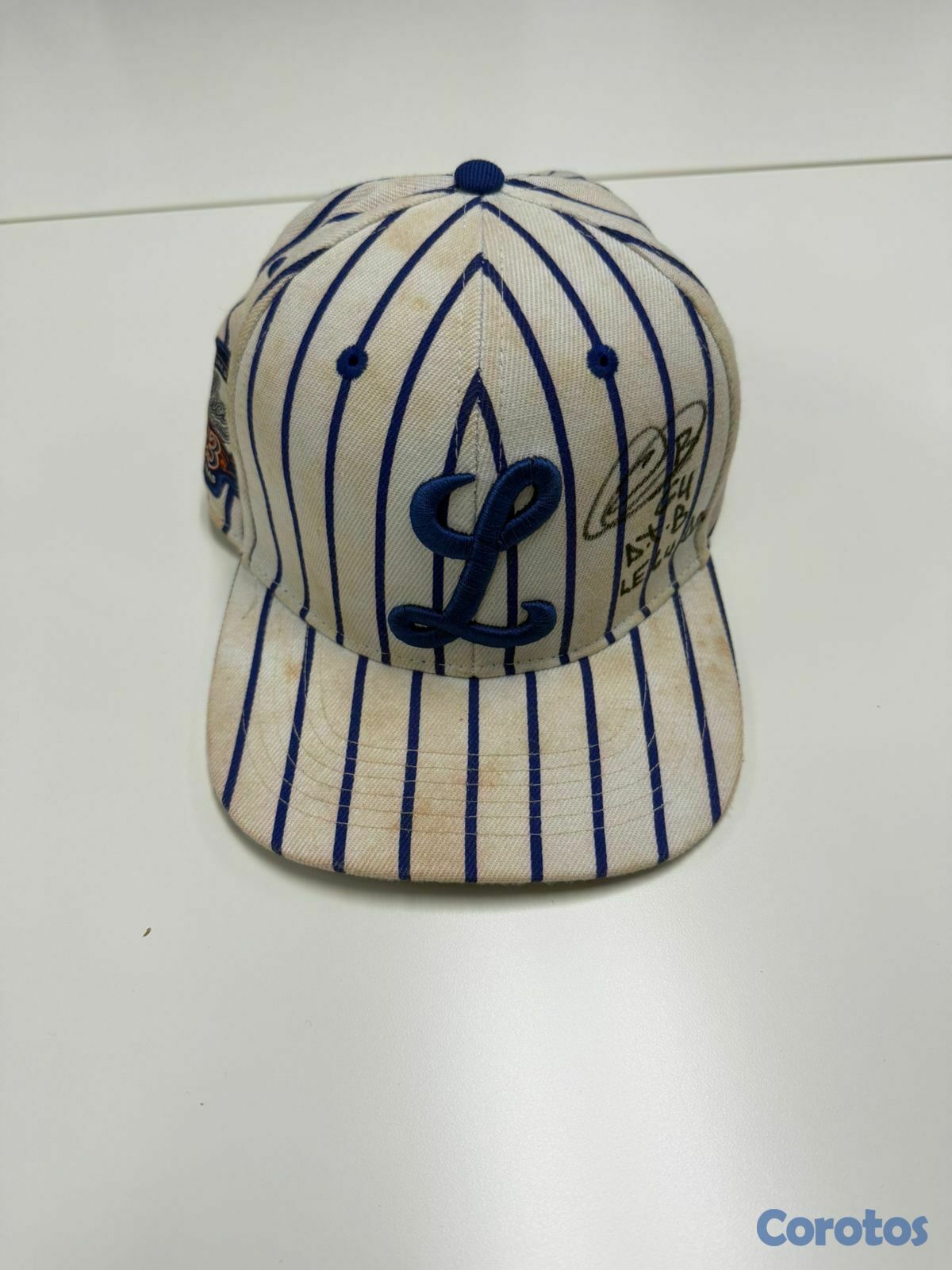 hobby y coleccion - Emilio Bonifacio - Gorra Game Used Autografiada 1