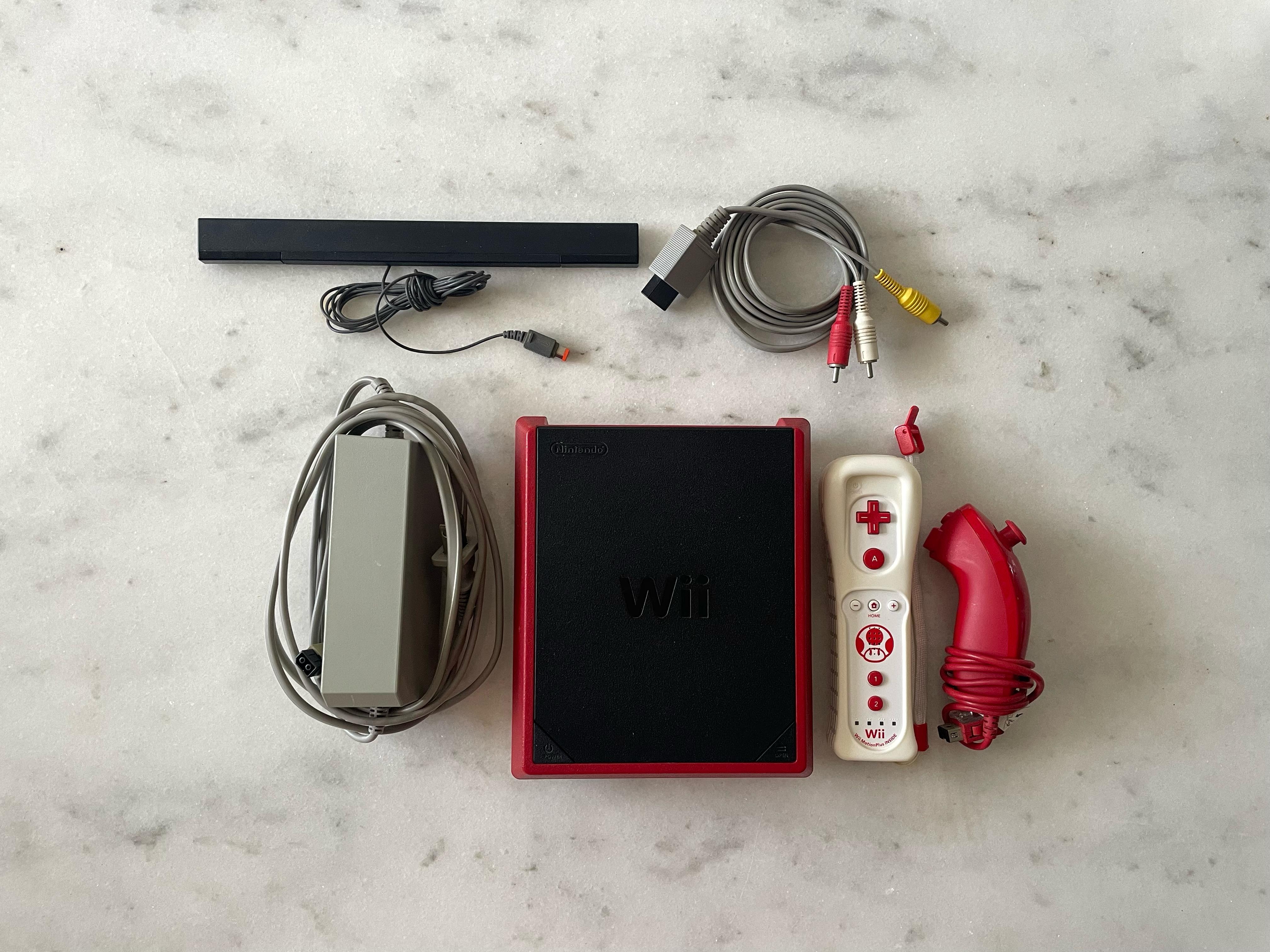 consolas y videojuegos - Nintendo wii mini con 12 cintas 