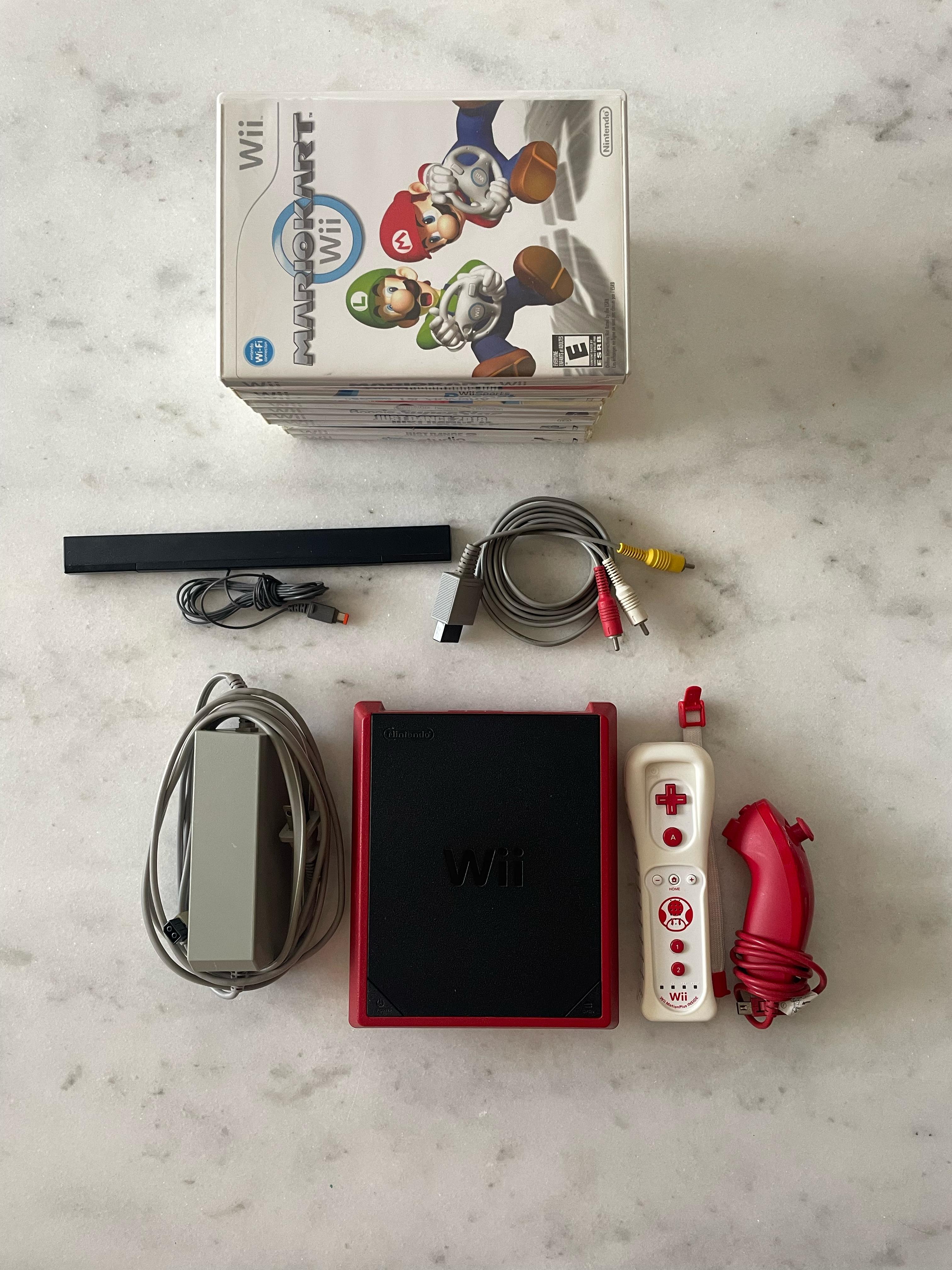 consolas y videojuegos - Nintendo wii mini con 12 cintas  1