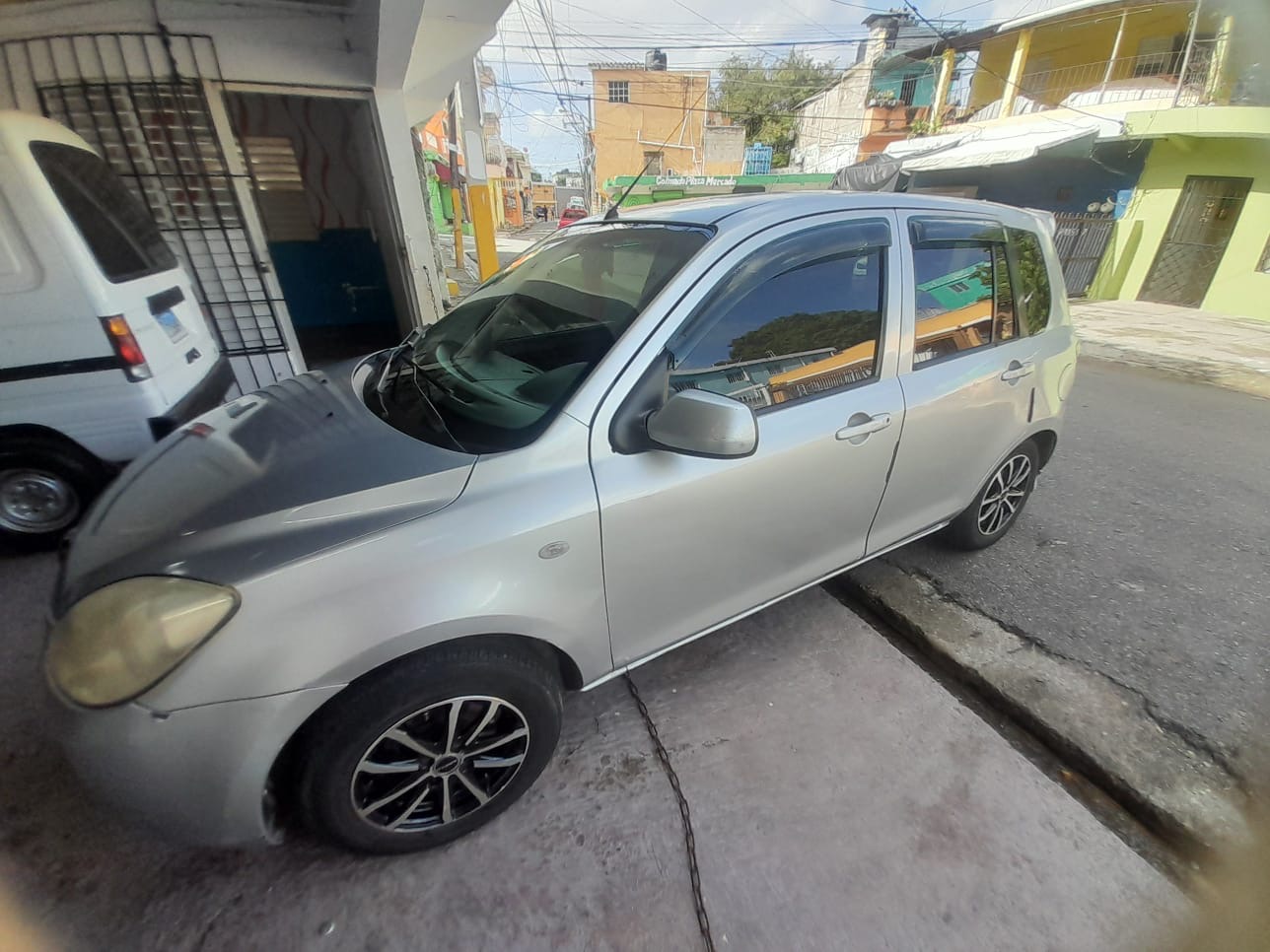 carros - Mazda Demio 2006 1