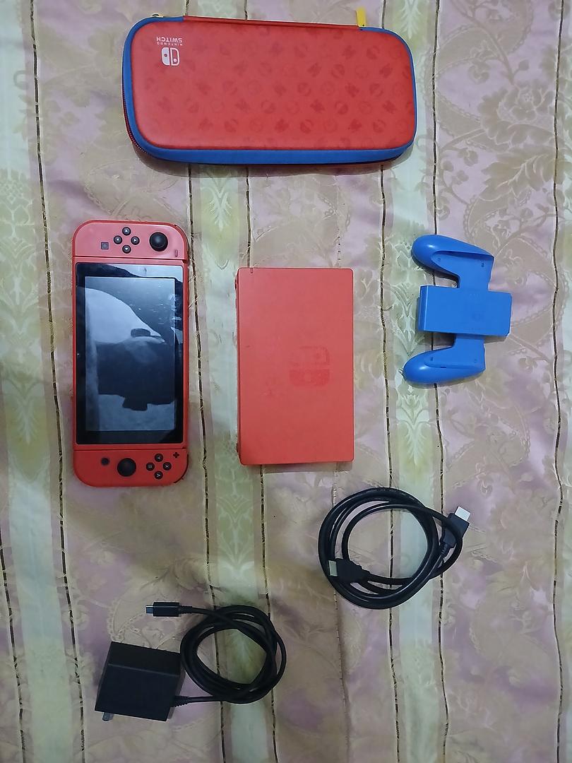 consolas y videojuegos - Nintendo switch de edición especial Mario  0