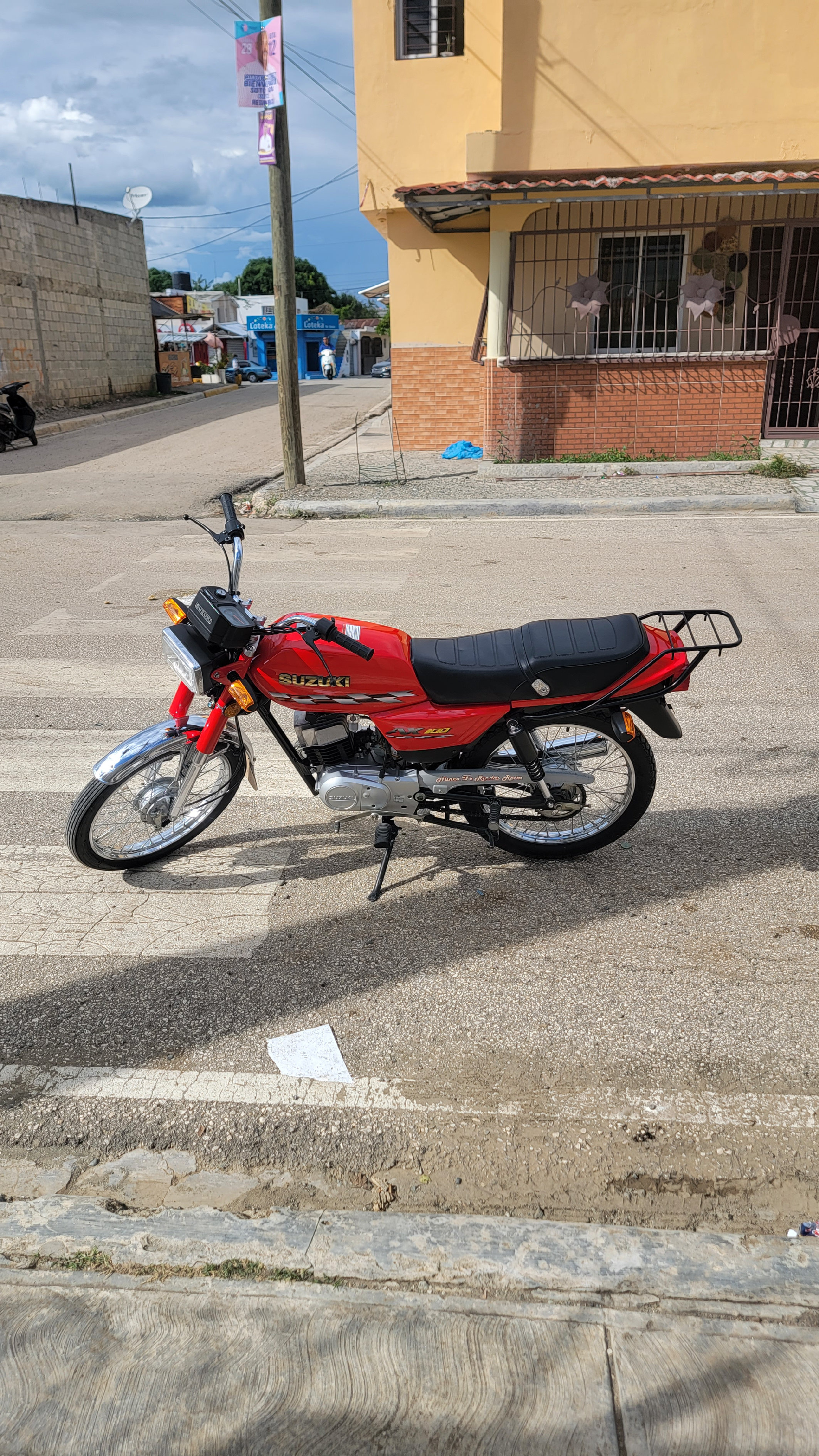 motores y pasolas - zuzuki ax100 1
