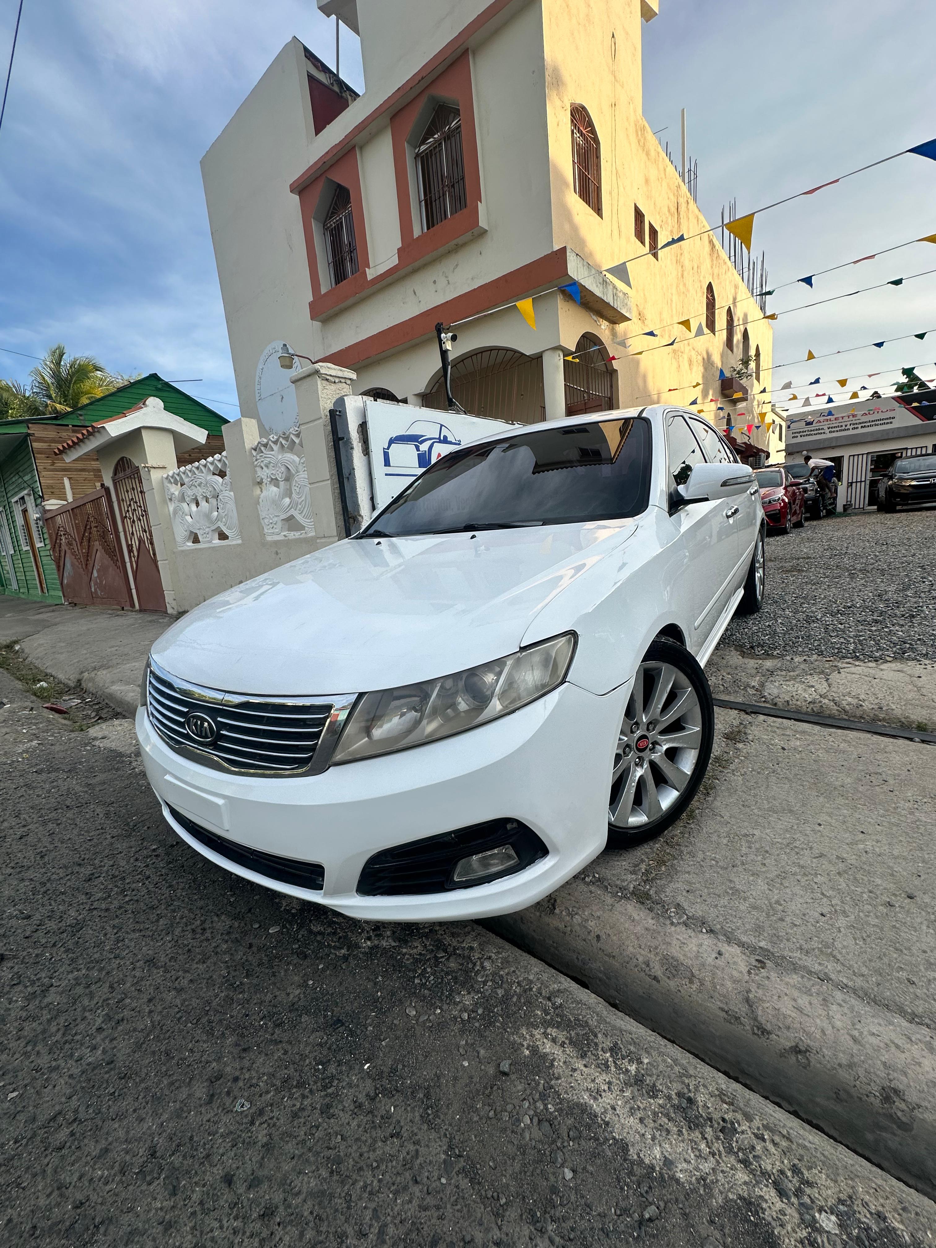 carros - Kia lotze 2009  0