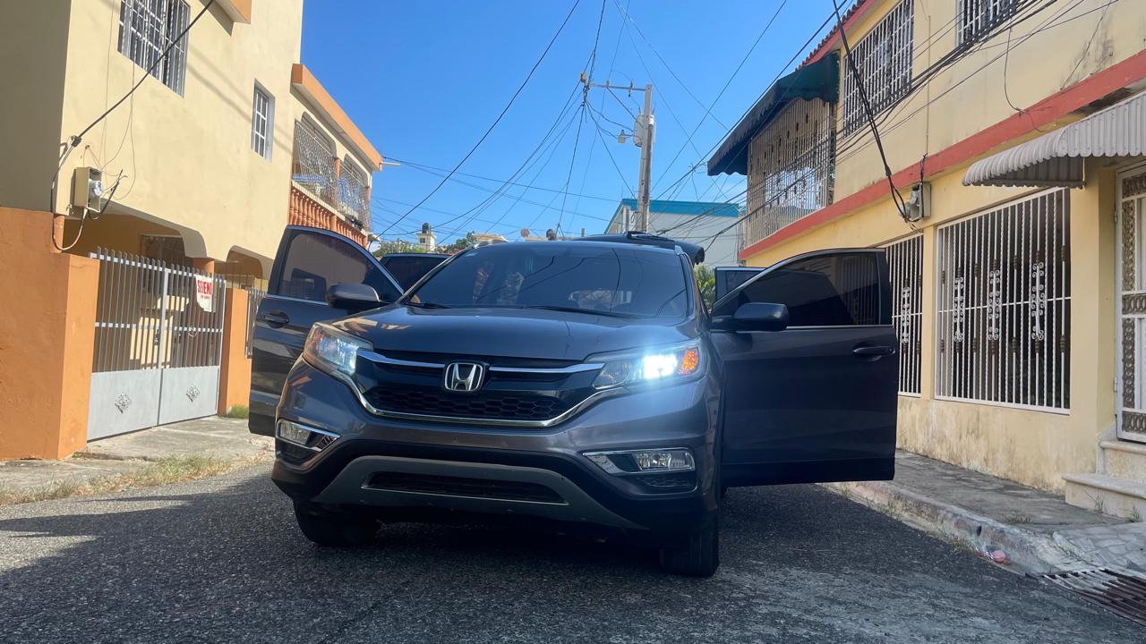 jeepetas y camionetas - VENDO HONDA MODELO CRV, POCO USO ESTA COMO NUEVA  9