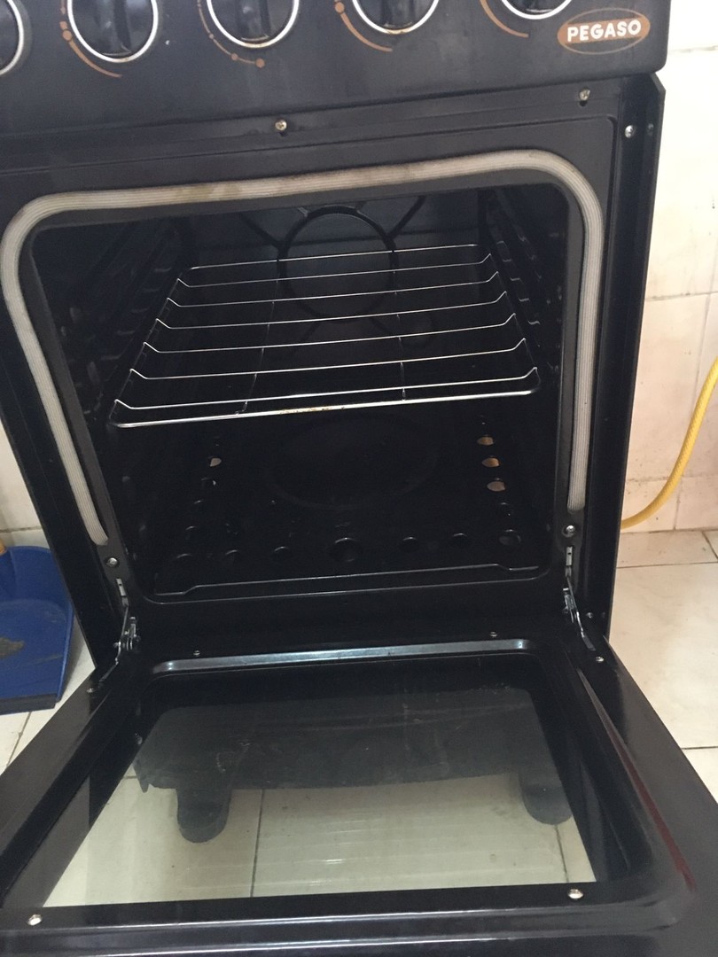 cocina - ESTUFA CON SU TANQUE DE GAS CON POCO USO. 0
