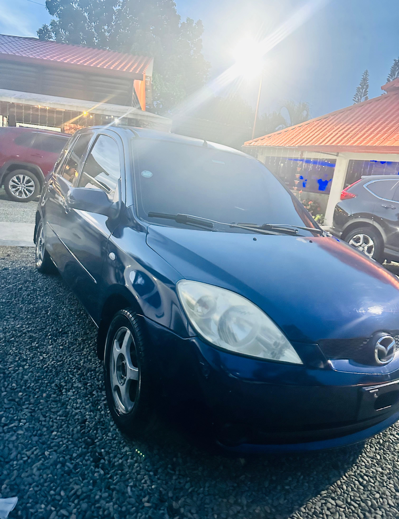 carros - Mazda Demio 2006 0