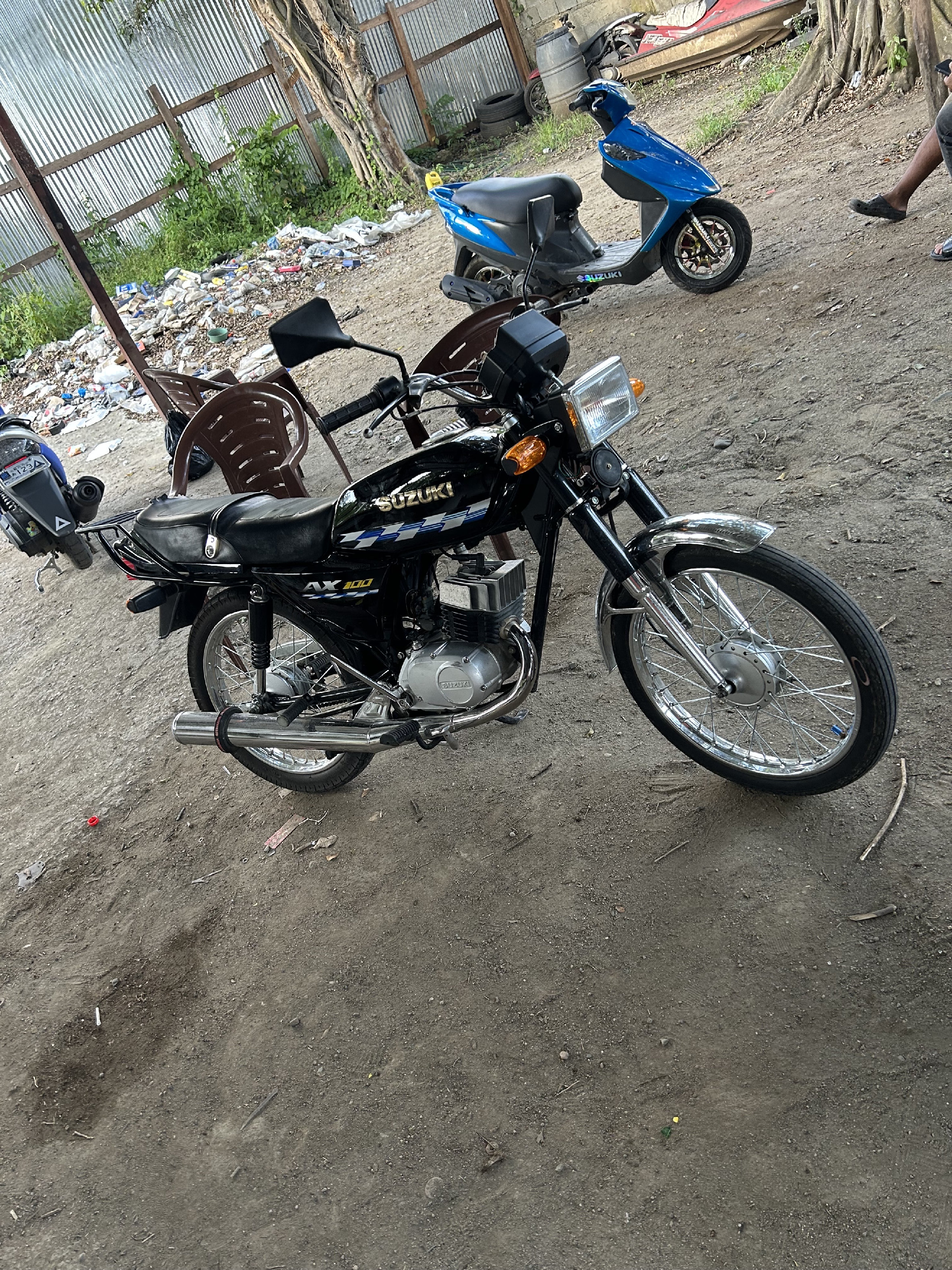 motores y pasolas - suzuki ax100  0