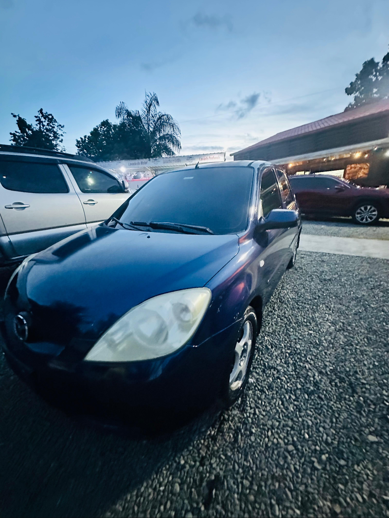 carros - Mazda Demio 2006 1