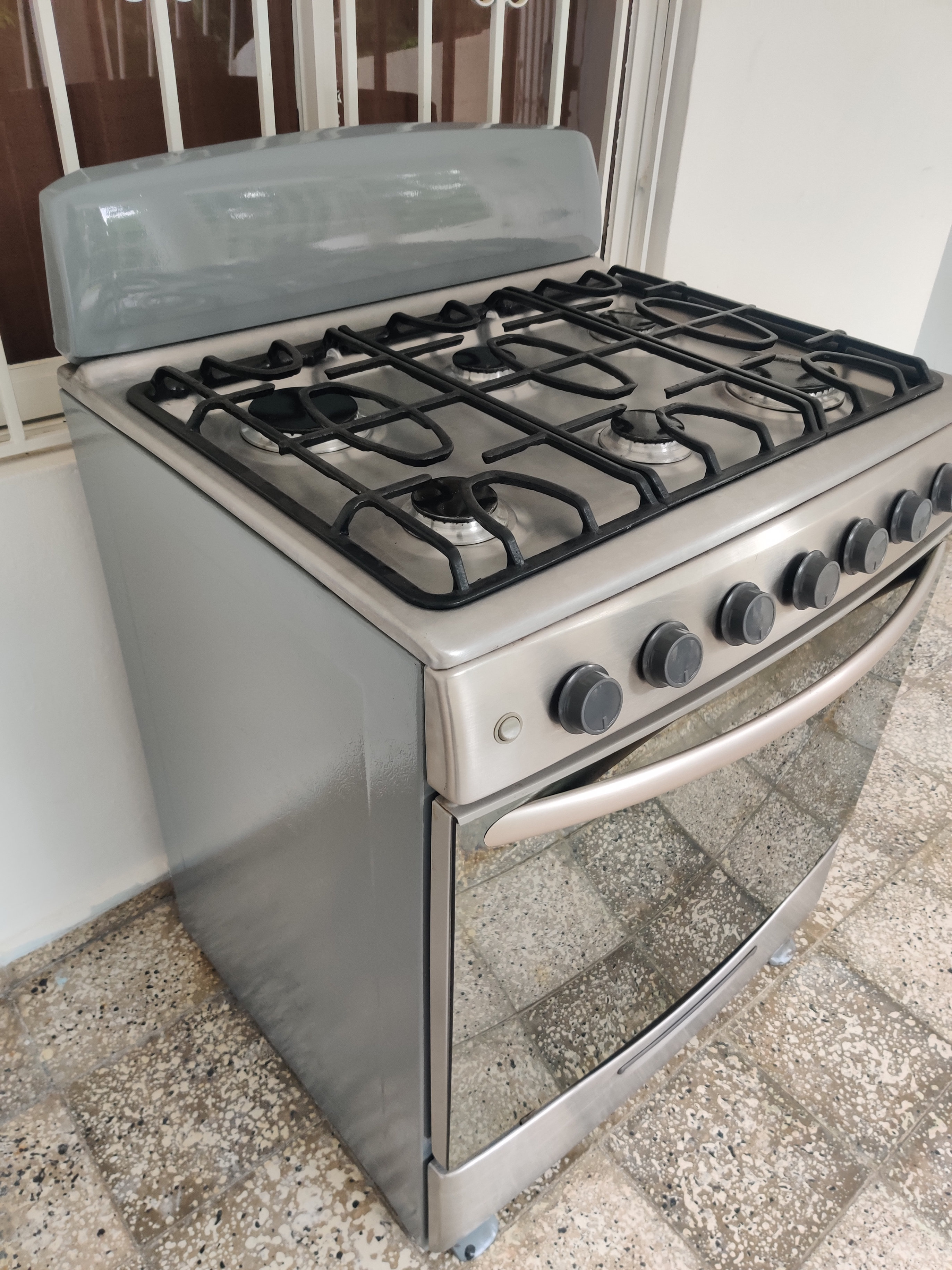 electrodomesticos - Estufa de 30 pulgadas General electric en excelente condiciones con garantía 1