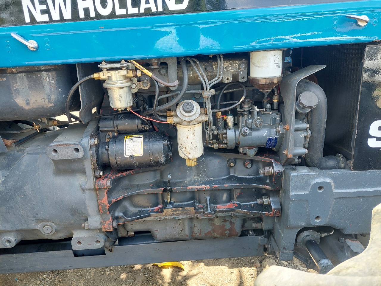 otros vehiculos - EN VENTA: Tractor New Holland 6610 4x4 con Rastra  7