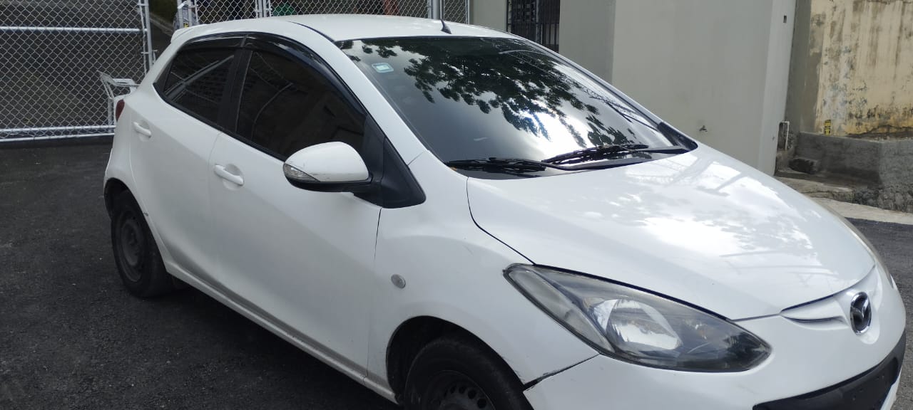 carros - Se vende Mazda Demio 2014,negociable. 5