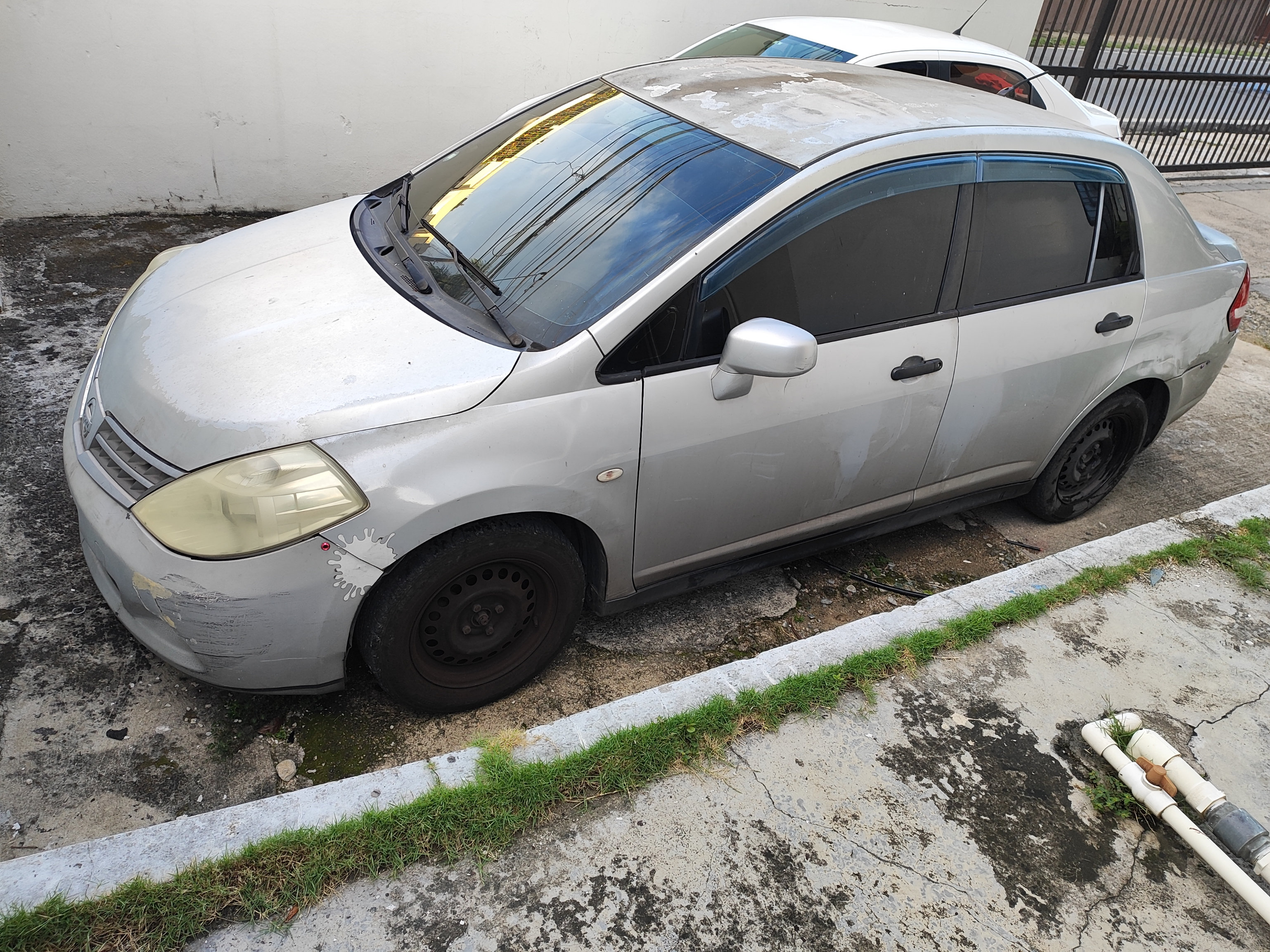 carros - vendo Nissan Tiida  ligeramente negociable 