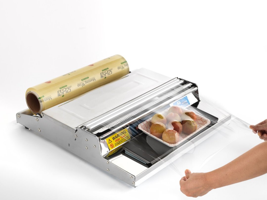 equipos profesionales - Rapeadora (Empacadora) de papel film para envolver alimentos 0