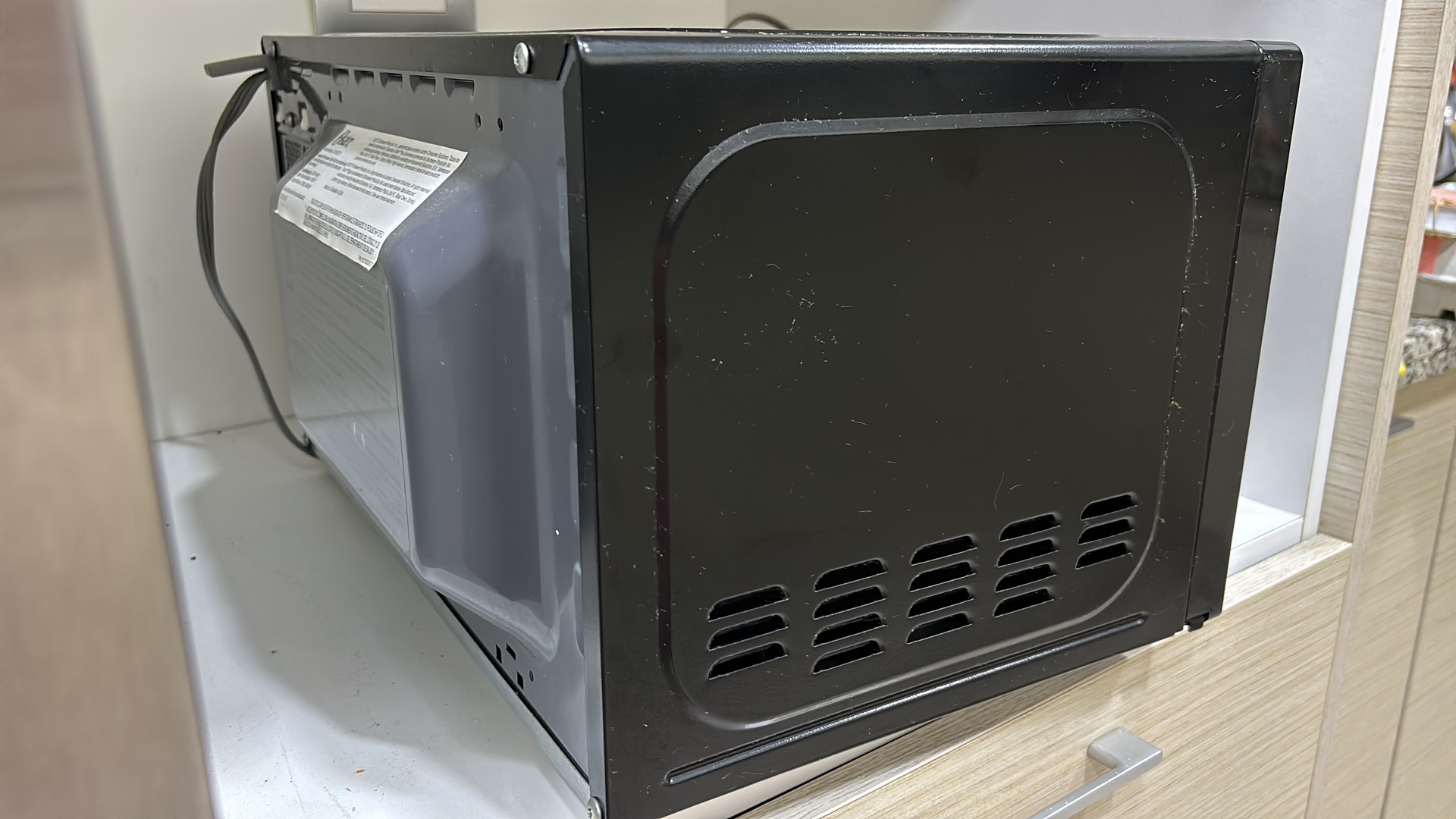 cocina - Microondas usado marca Oster  4