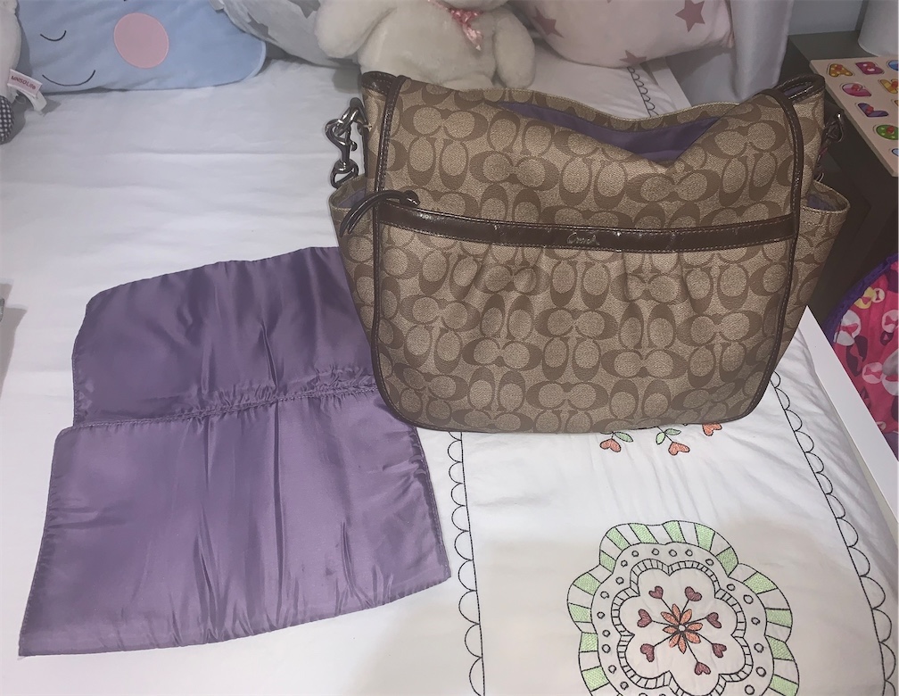accesorios - Pañalera Coach en excelentes condiciones 0