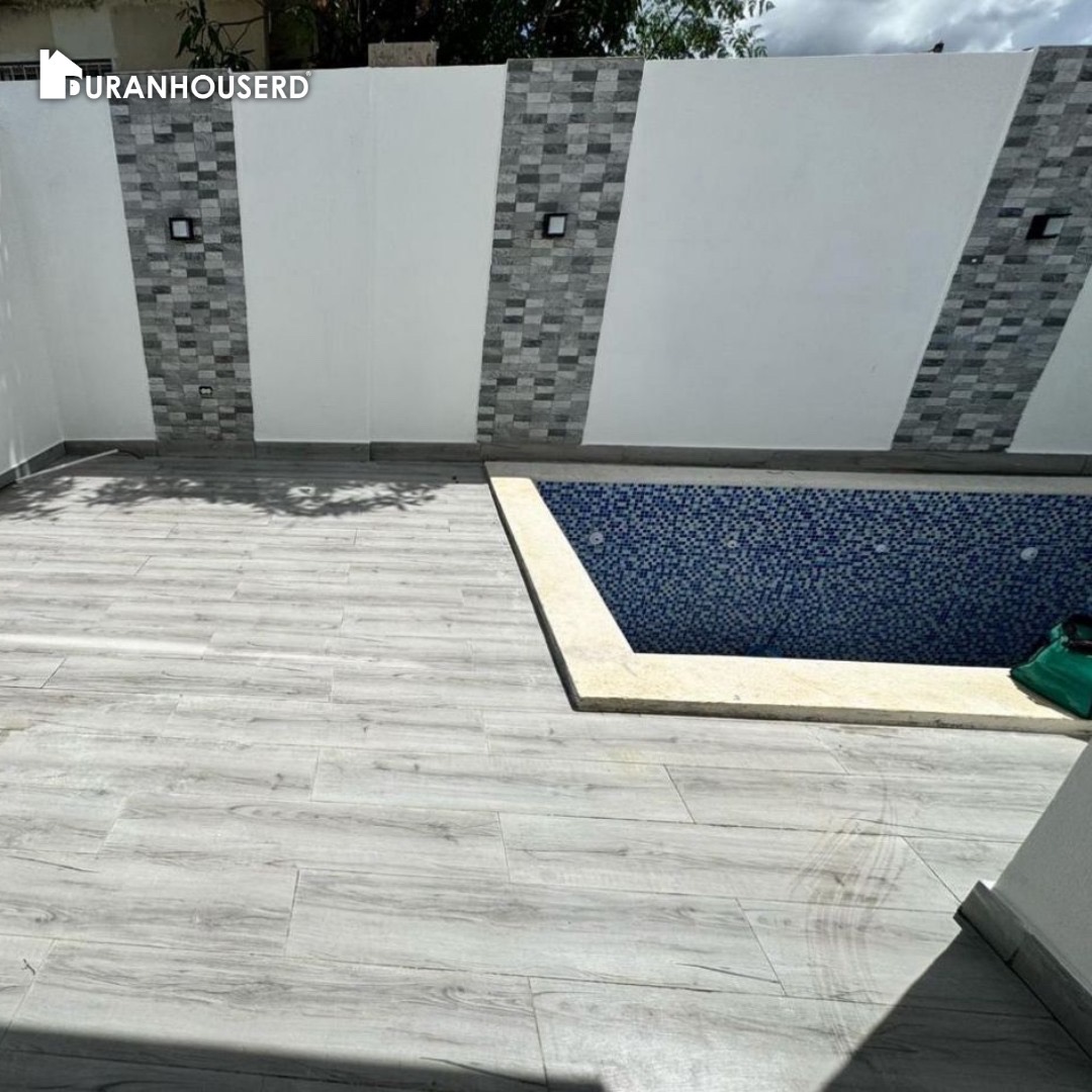 casas - venta de casa con piscina en la autopista de san isidro Santo Domingo este  7