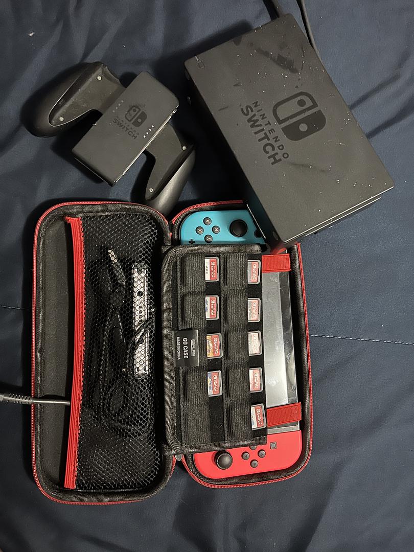 consolas y videojuegos - Paquete de Nintendo switch consola y nueve juegos, en perfecto funcionamiento!! 2