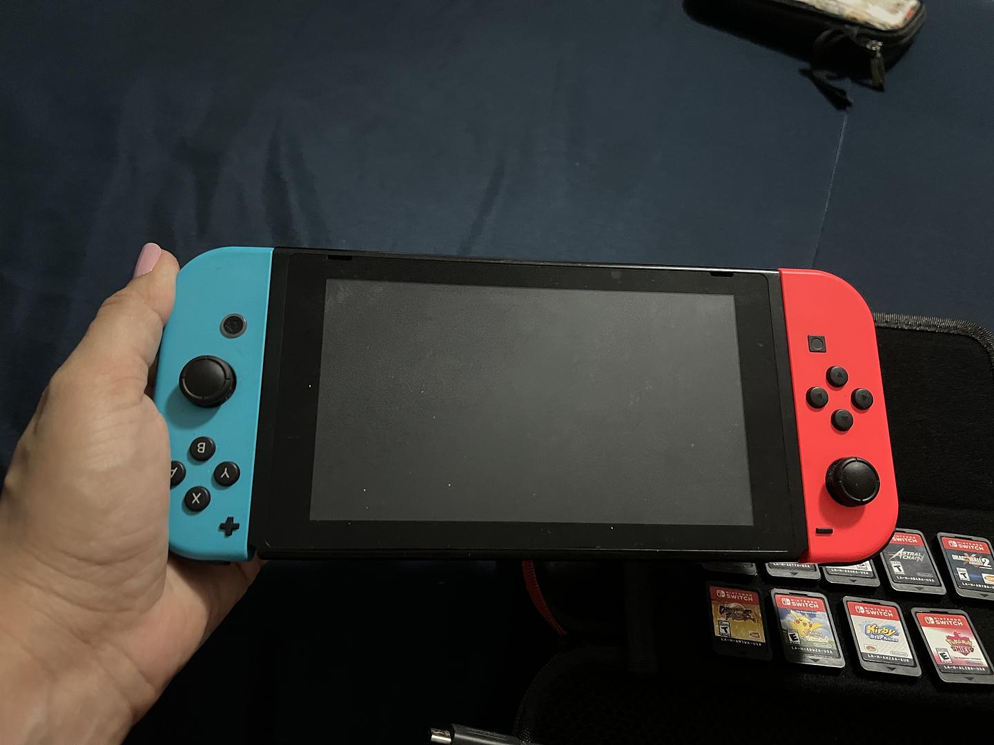 consolas y videojuegos - Paquete de Nintendo switch consola y nueve juegos, en perfecto funcionamiento!! 3