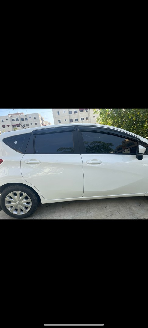 carros - Nissan Note Versa 2015 Americana muy buen estado.650,000 negociable. 8