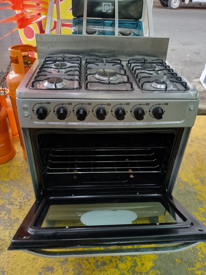 electrodomesticos - Estufa de 30 pulgada medio uso en condicion  1